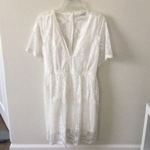 White lace dress from Bella Ella Boutique